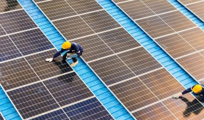 Photovoltaic,Engineers,Work,On,Roof,Top,Warehouse.,Workers,Inspect,And